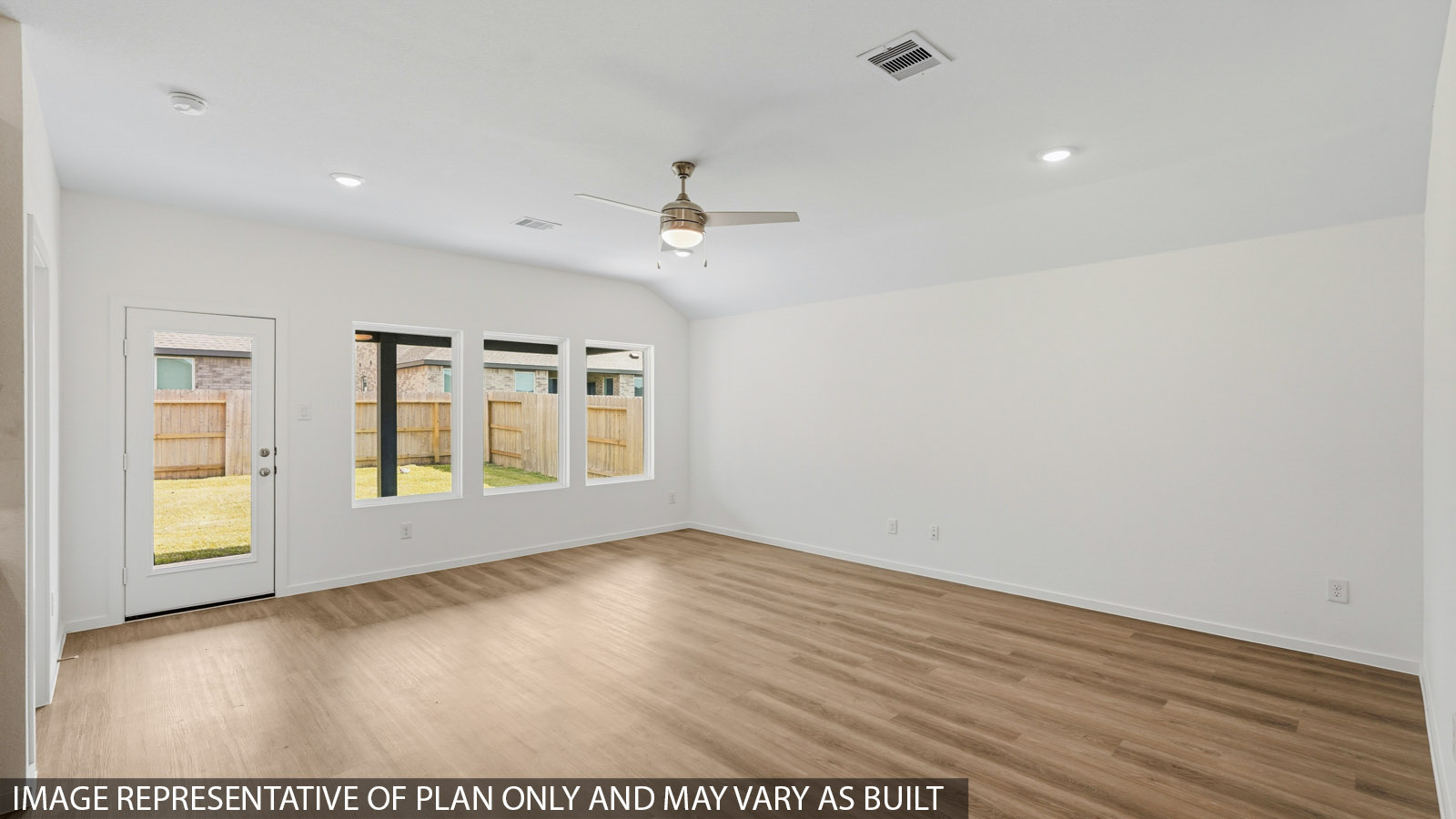 open concept living and dining area with vinyl flooring and large windows