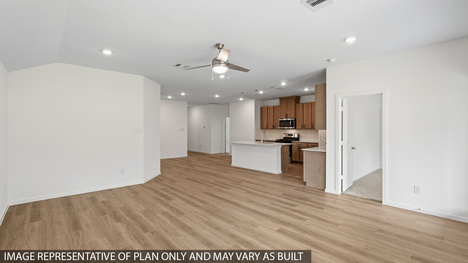 open concept living and dining area with vinyl flooring and large windows