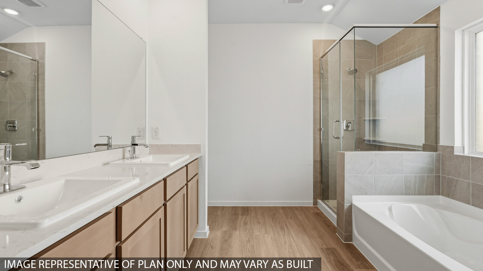 primary bathroom with separate tub and shower