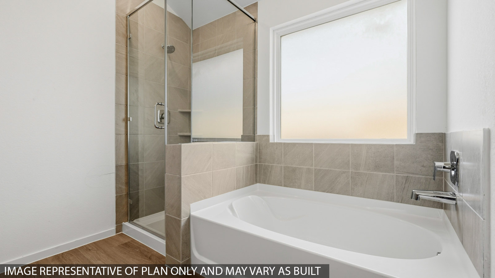 primary bathroom with separate tub and shower