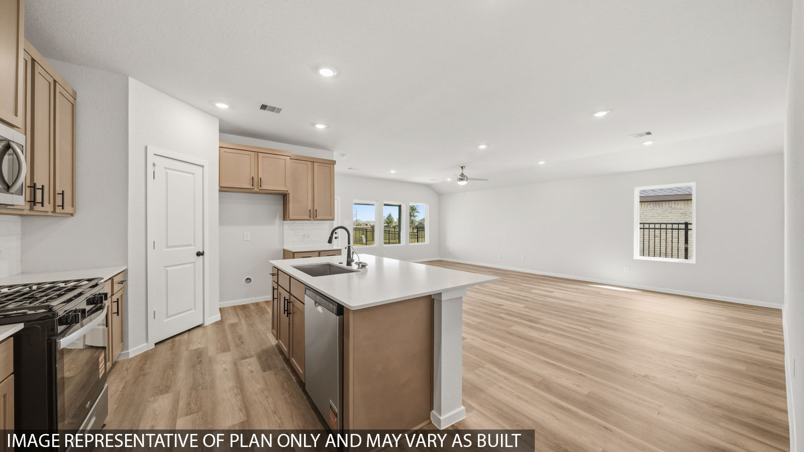 open concept living and dining area with vinyl flooring, large windows, and vinyl flooring