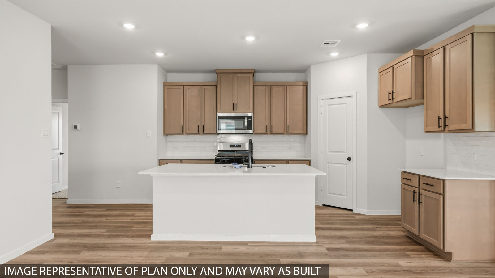 open concept living and dining area with vinyl flooring, large windows, and vinyl flooring