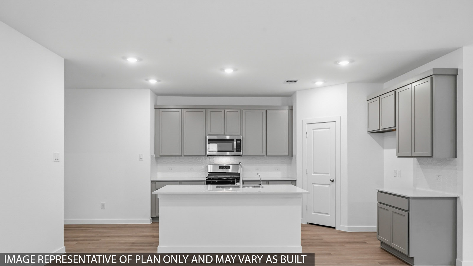 kitchen with quartz countertops and stainless steel appliances