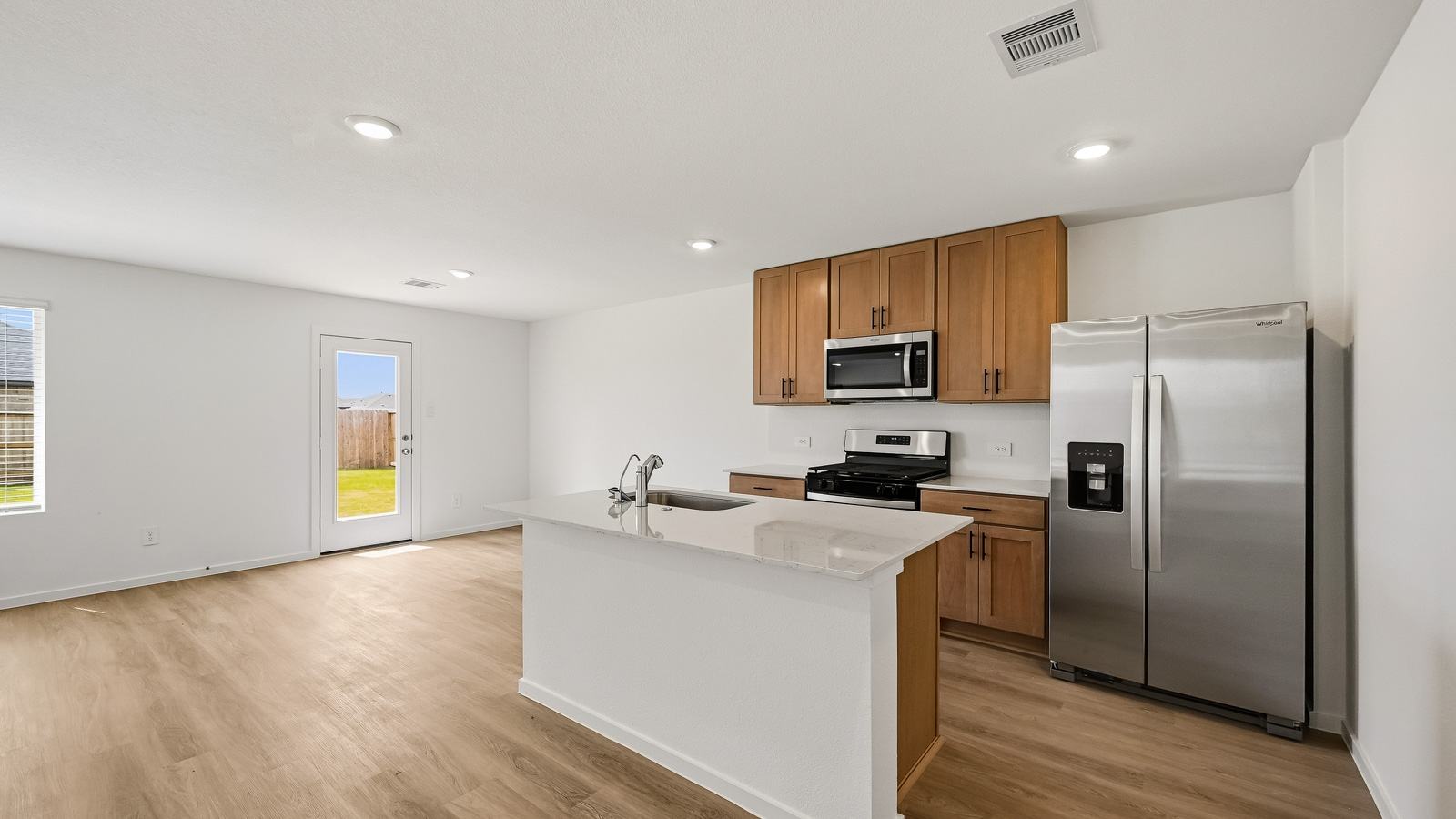 kitchen with quartz countertops and stainless steel appliances