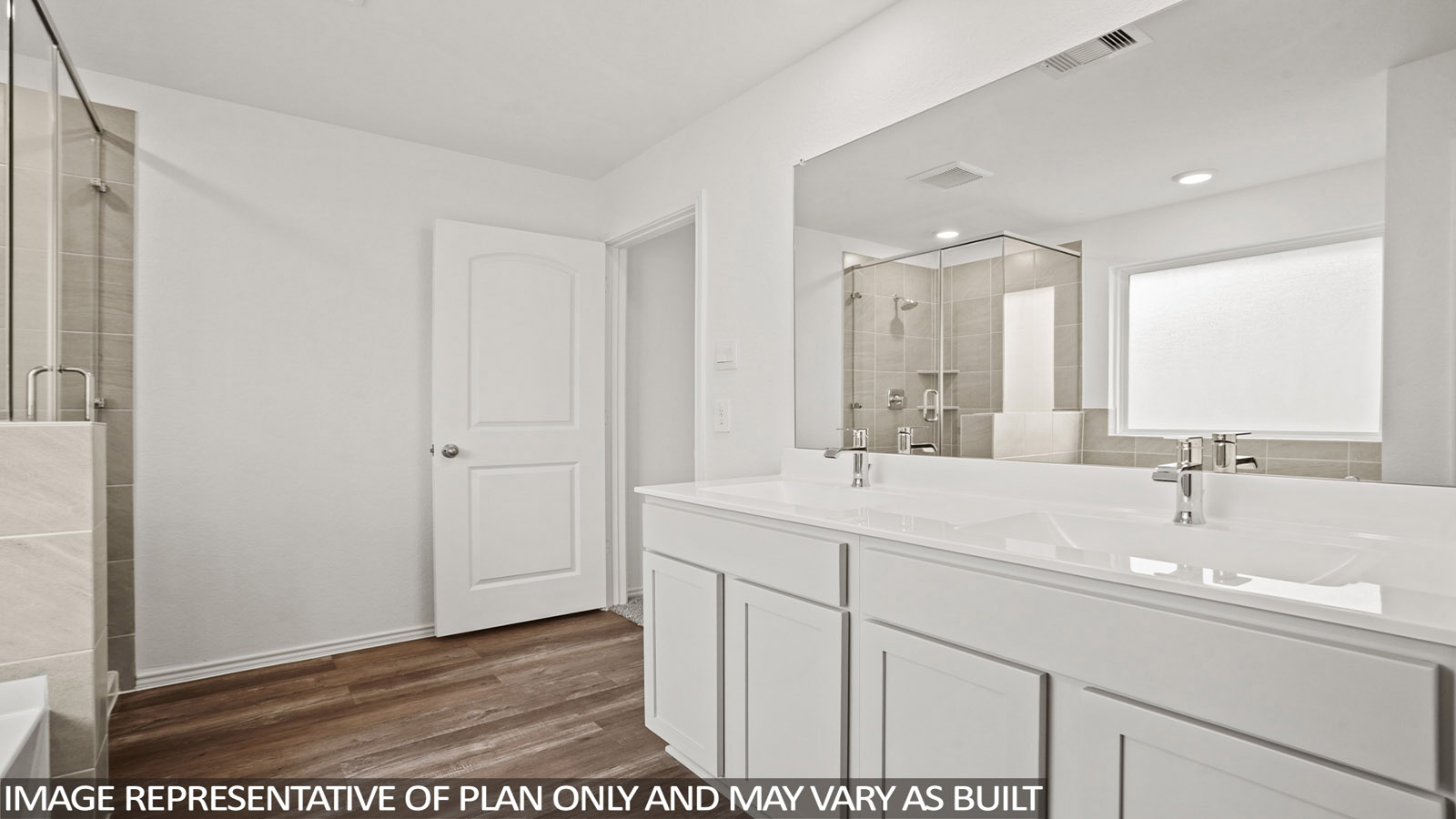 Primary bathroom with tub and shower