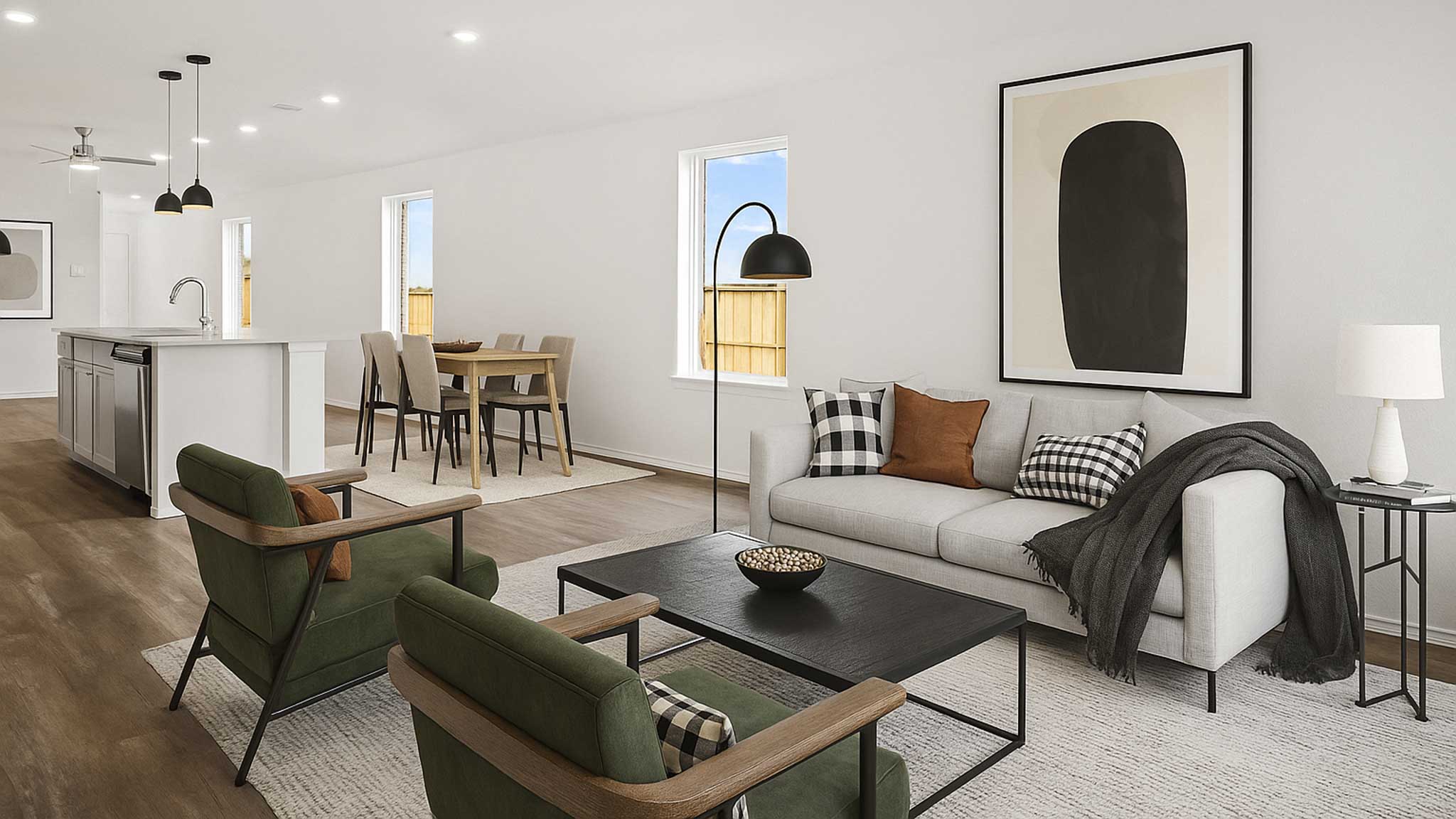 open concept livving and dining area with vinyl flooring and quartz countertops