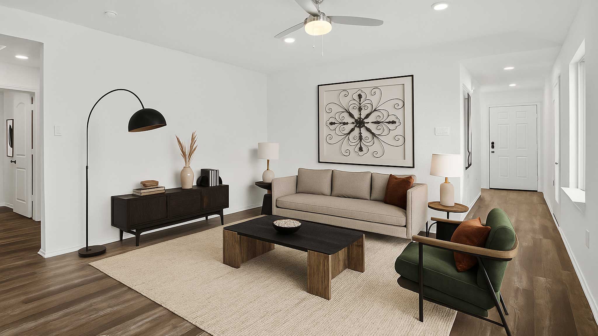 open concpt living and dining area with vinyl  flooring, quartz countertops, and large windows