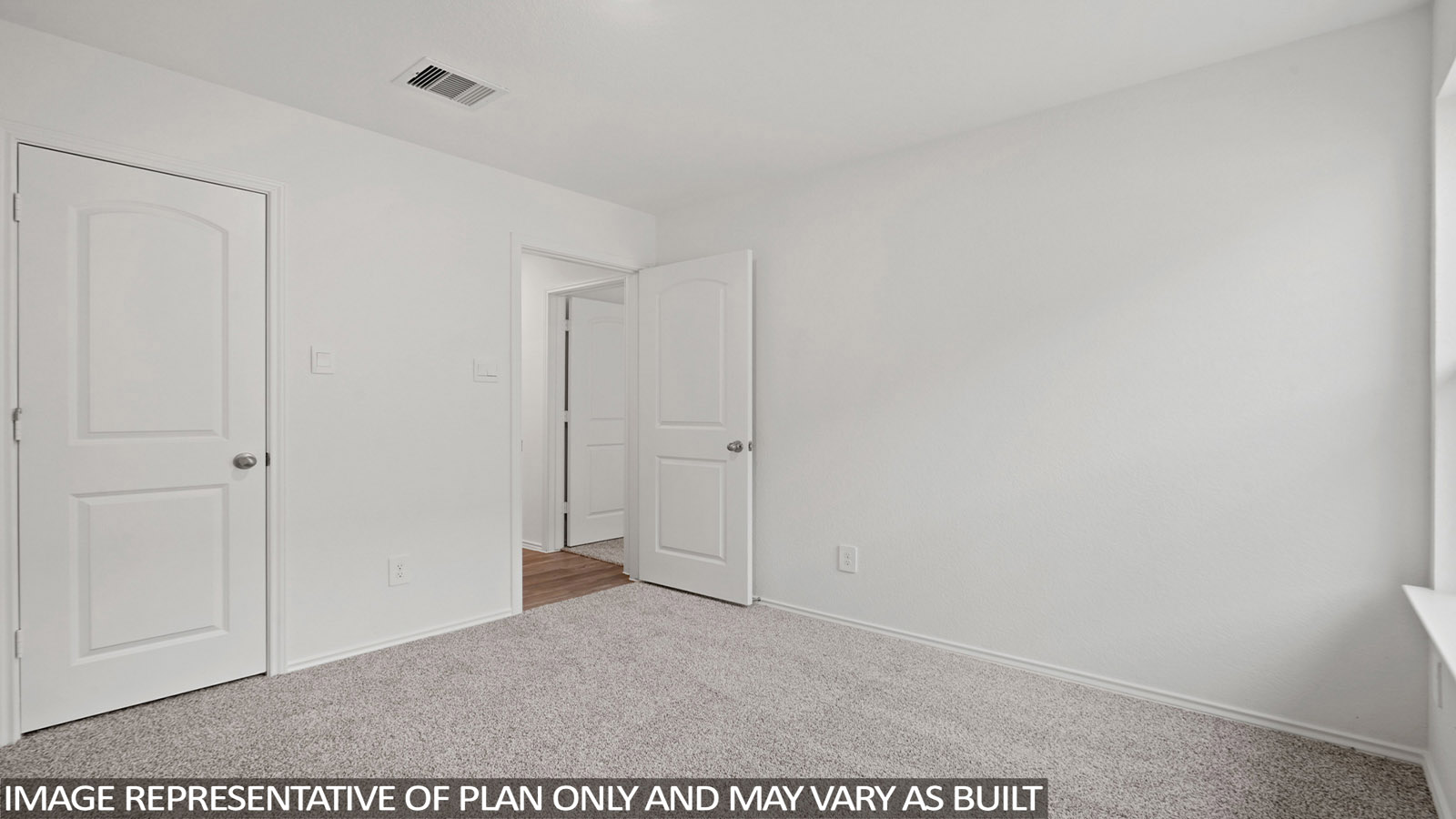 bedroom with Mohawk carpet flooring