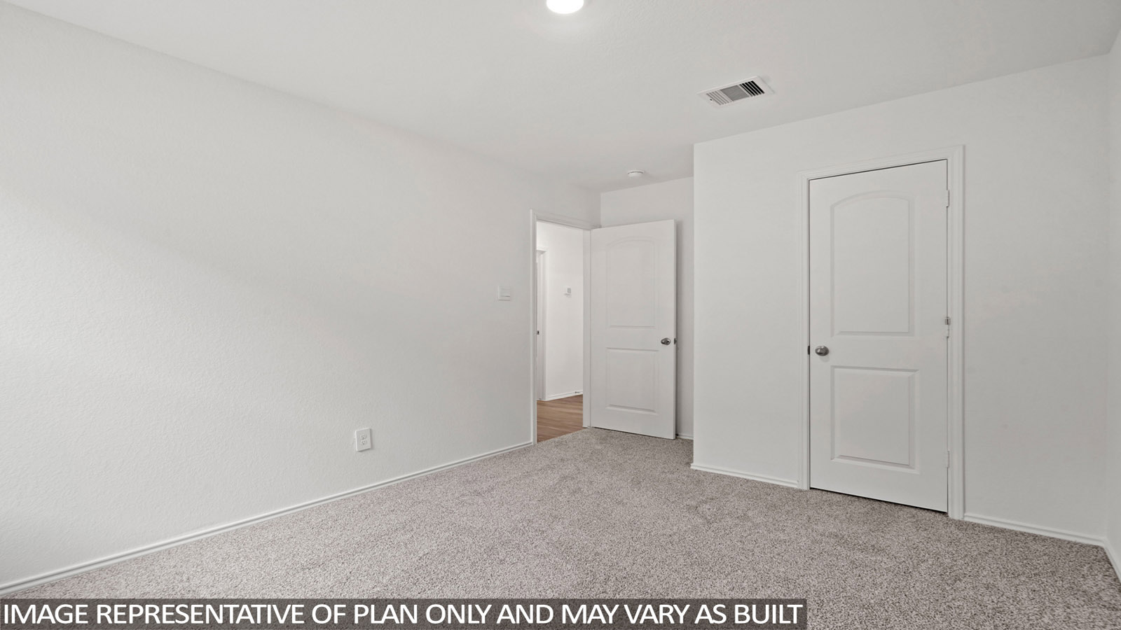 bedroom with Mohawk carpet flooring