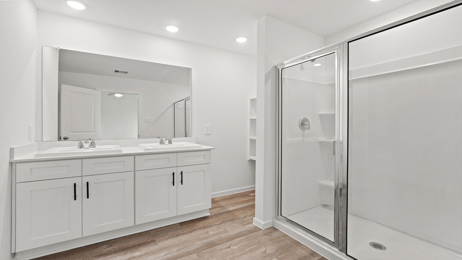 Primary bathroom with tub and shower