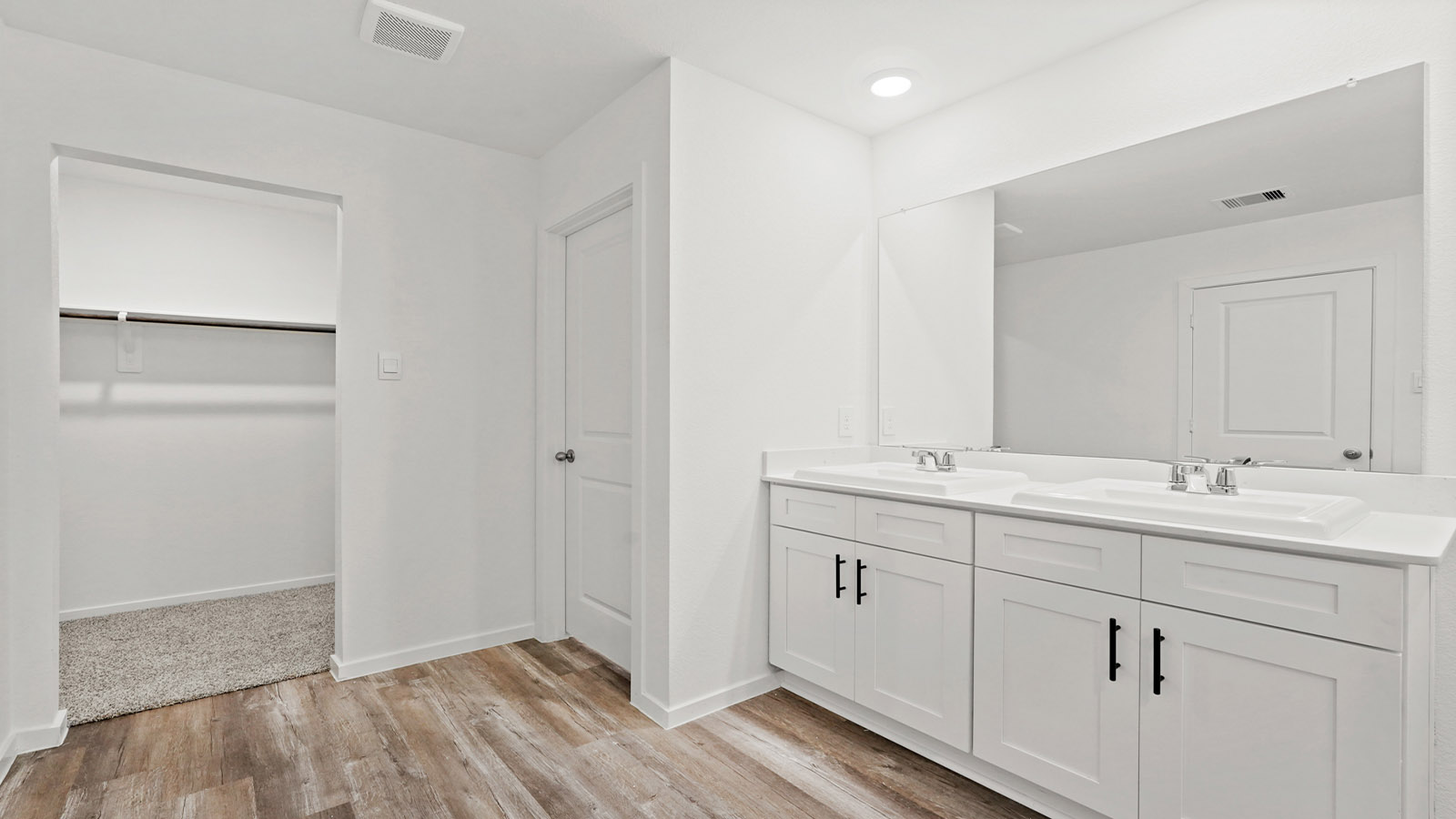 Primary bathroom with tub and shower