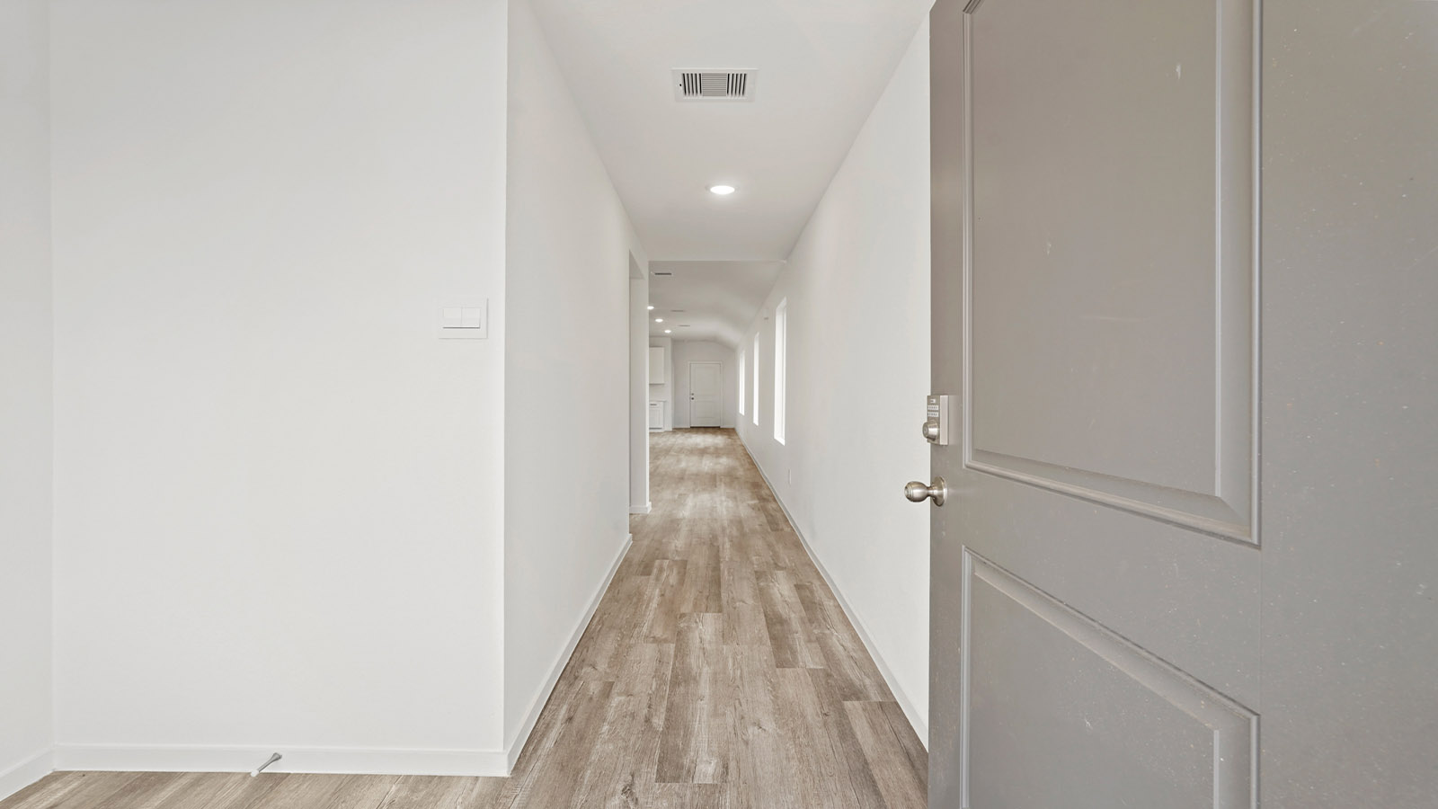Entry hallway with vinyl flooring