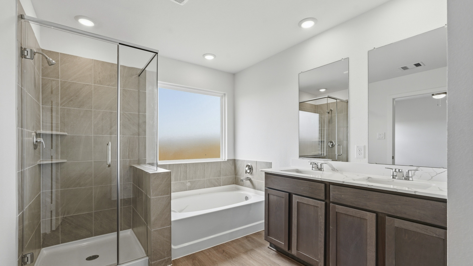 primary bathroom with seperate tub and shower in Katy, TX