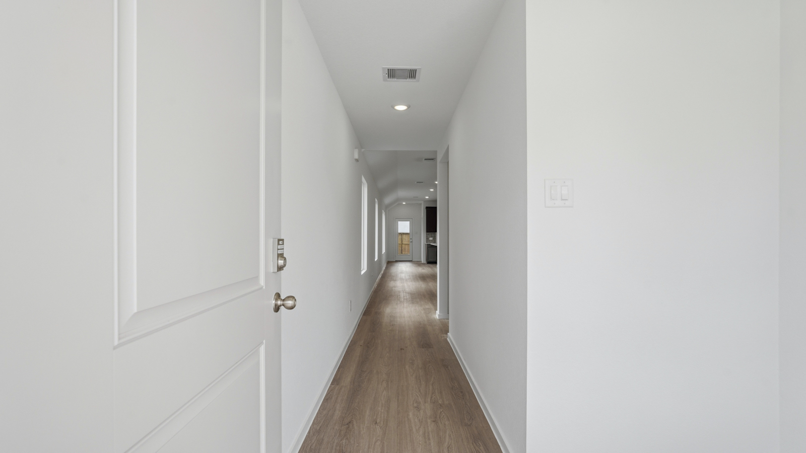hallways with vinyl flooring