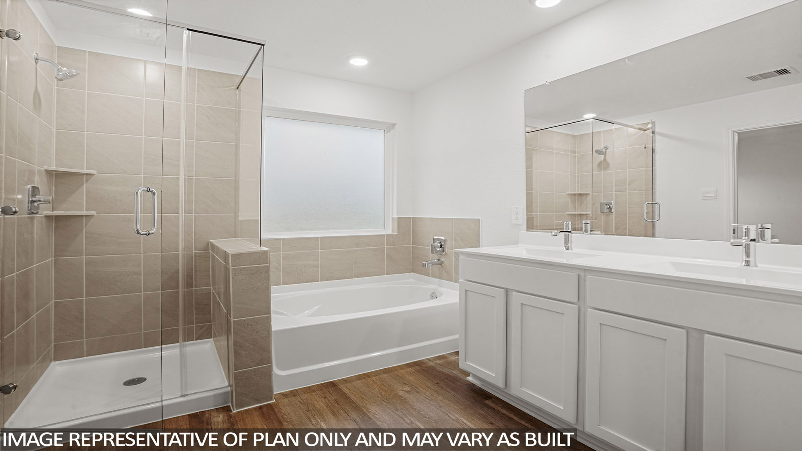 primary bathroom with separate tub and shower