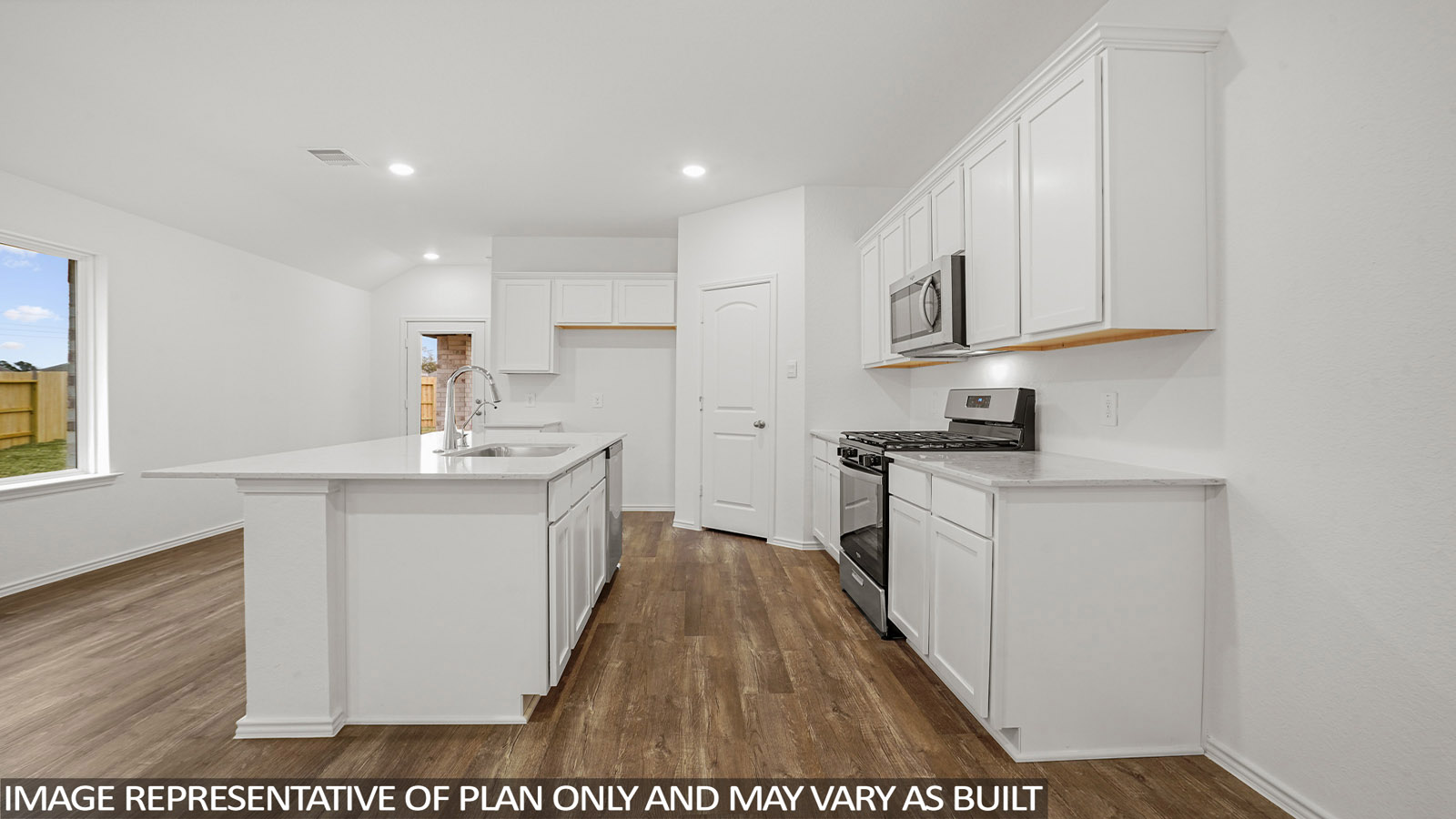 open concept living and dining area with vinyl flooring, quartz countertops, and stainless steel appliances in Katy, Tx