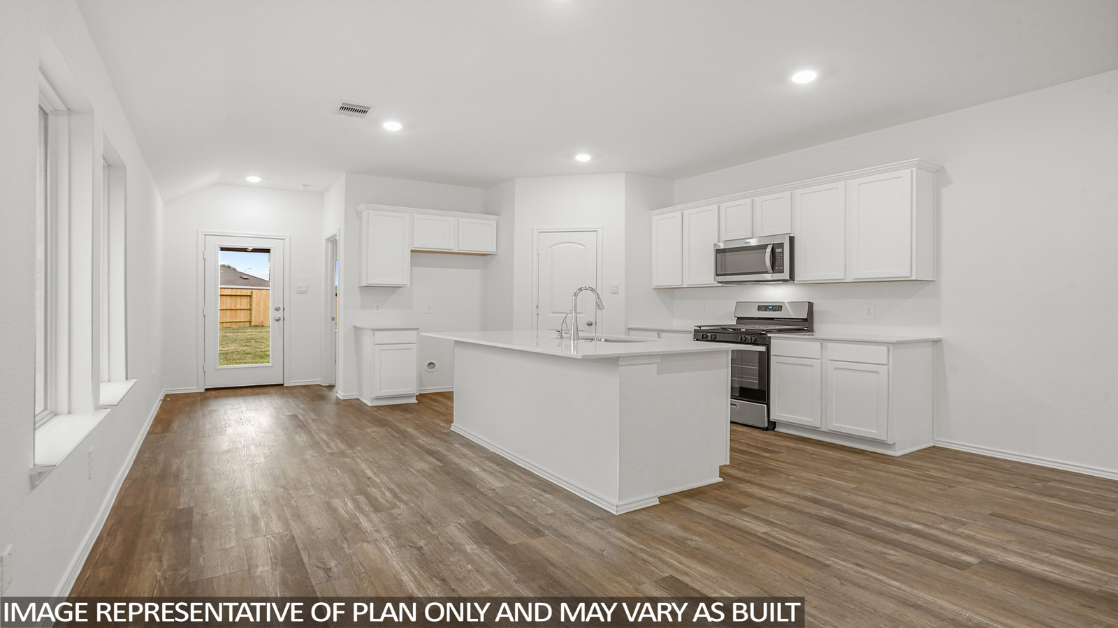 open concept living and dining area with vinyl flooring, large windows, and quartz countertops in Katy, TX