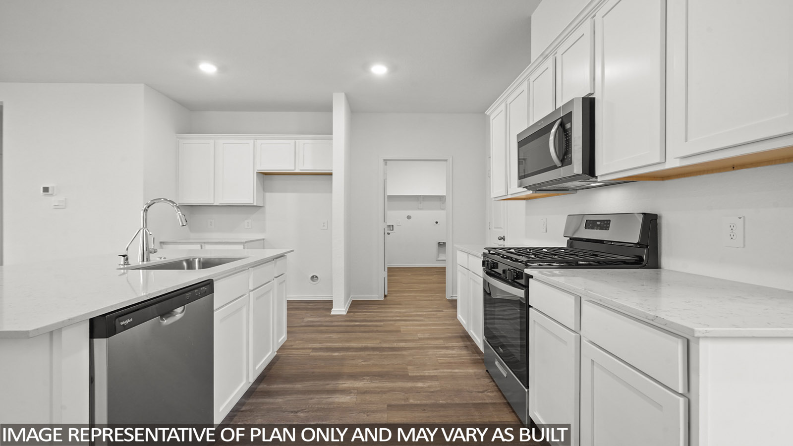 open concept living and dining area with vinyl flooring, large windows, and quartz countertops