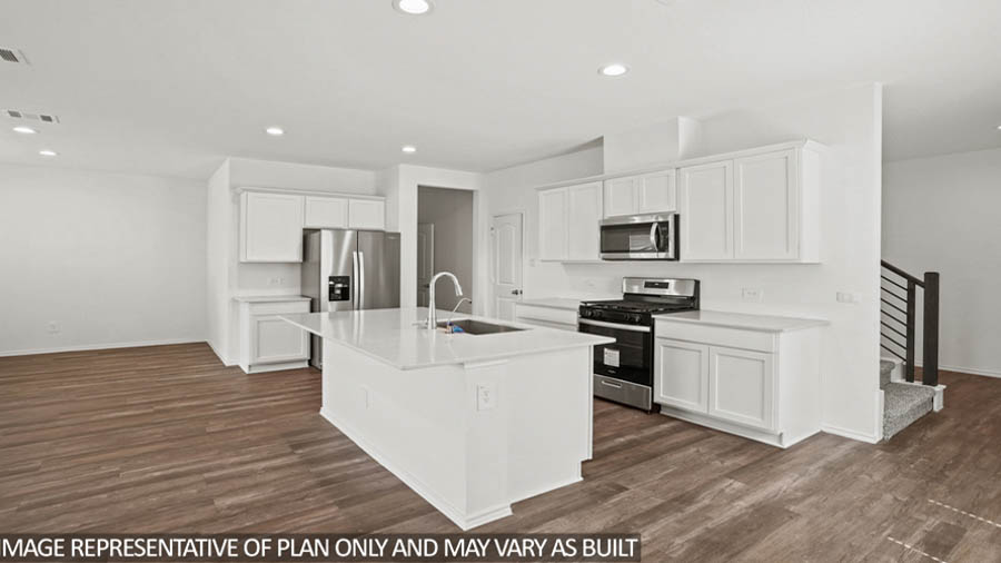 open concept livving and dining area with vinyl flooring, large windows, and quartz countertops in Katy, TX