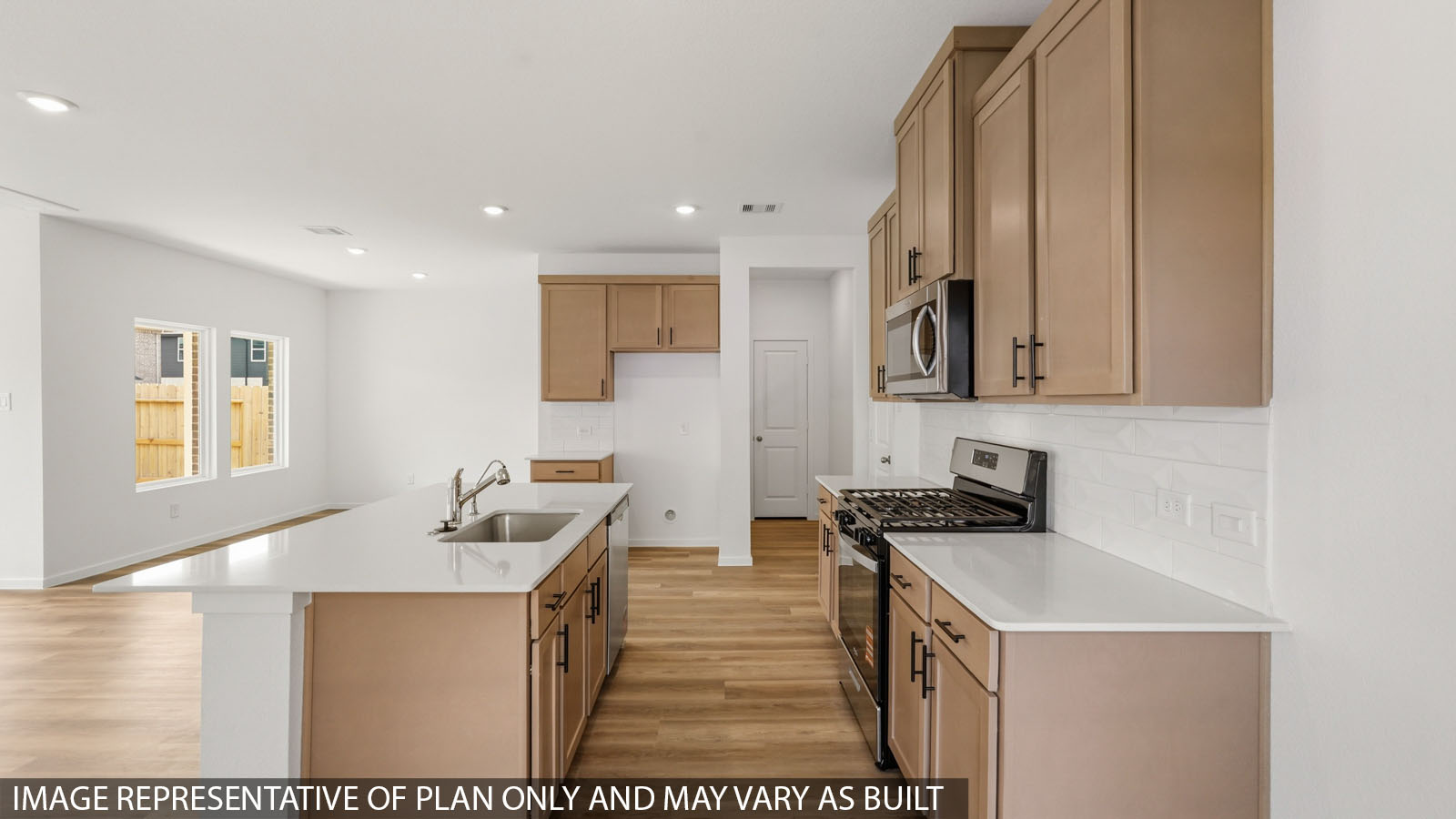kitchen with quartz countertops and stainless steel appliances