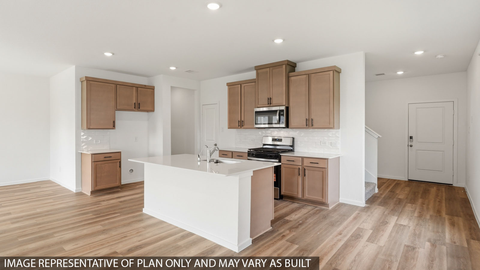 kitchen with quartz countertops and stainless steel appliances