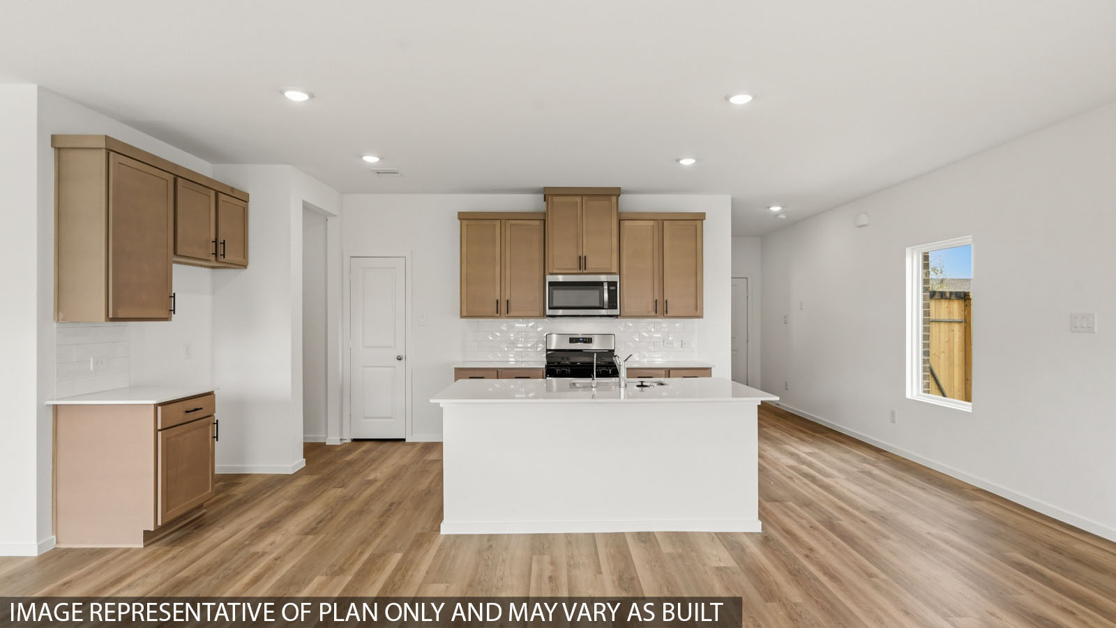kitchen with quartz countertops and stainless steel appliances