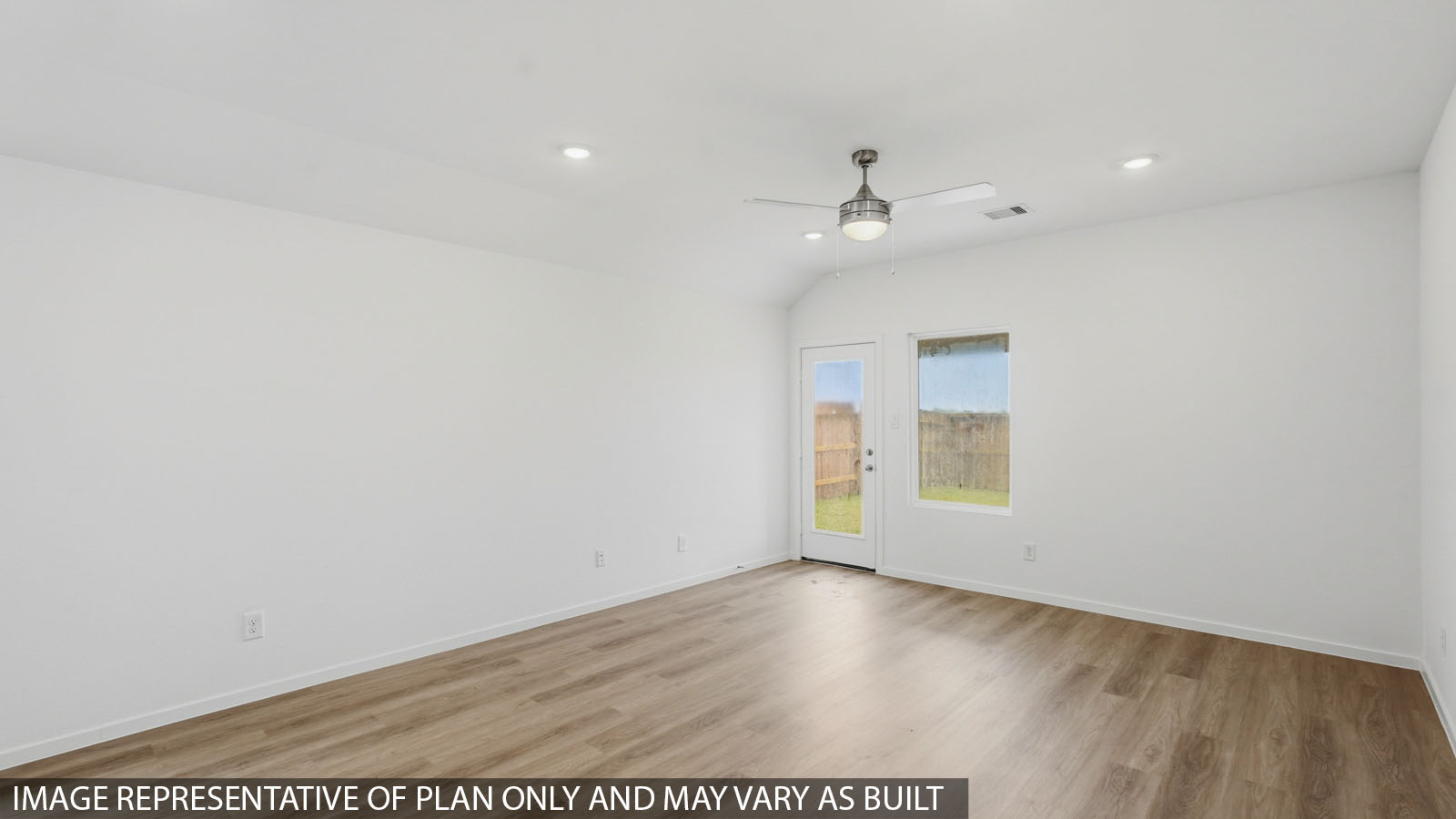 open concept living and dining area with vinyl flooring with quartz countertops