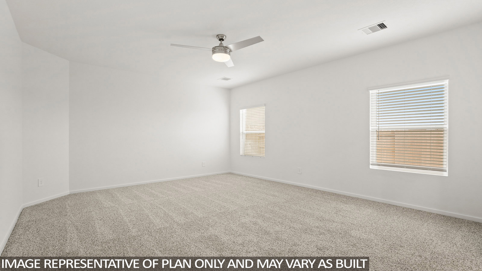 Primary bedroom with carpet flooring