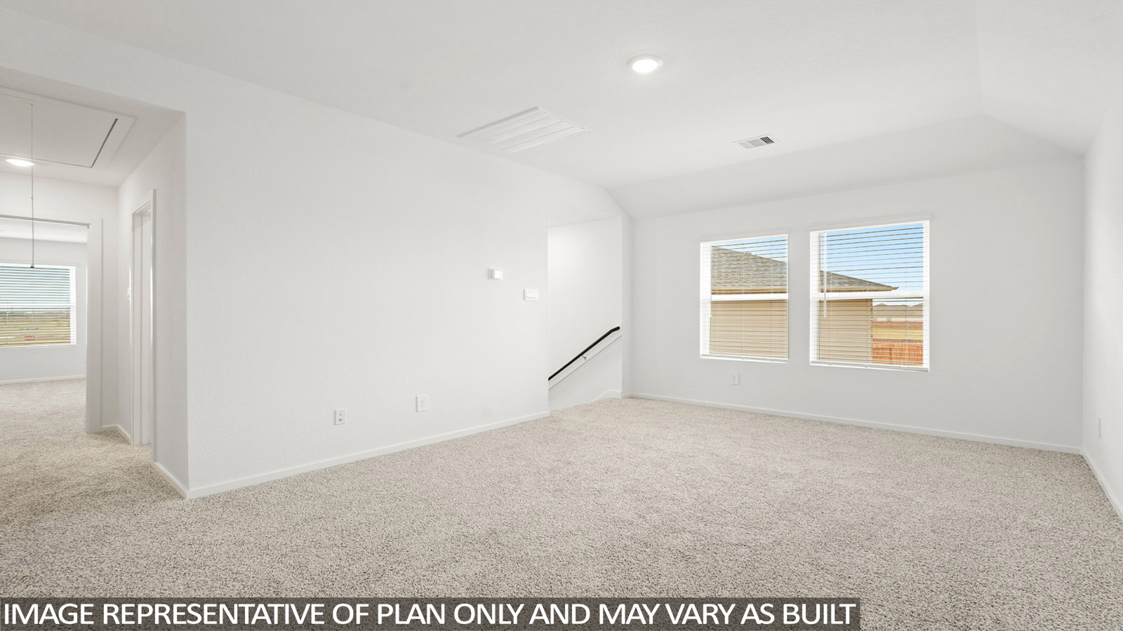 Second story game room with carpet flooring