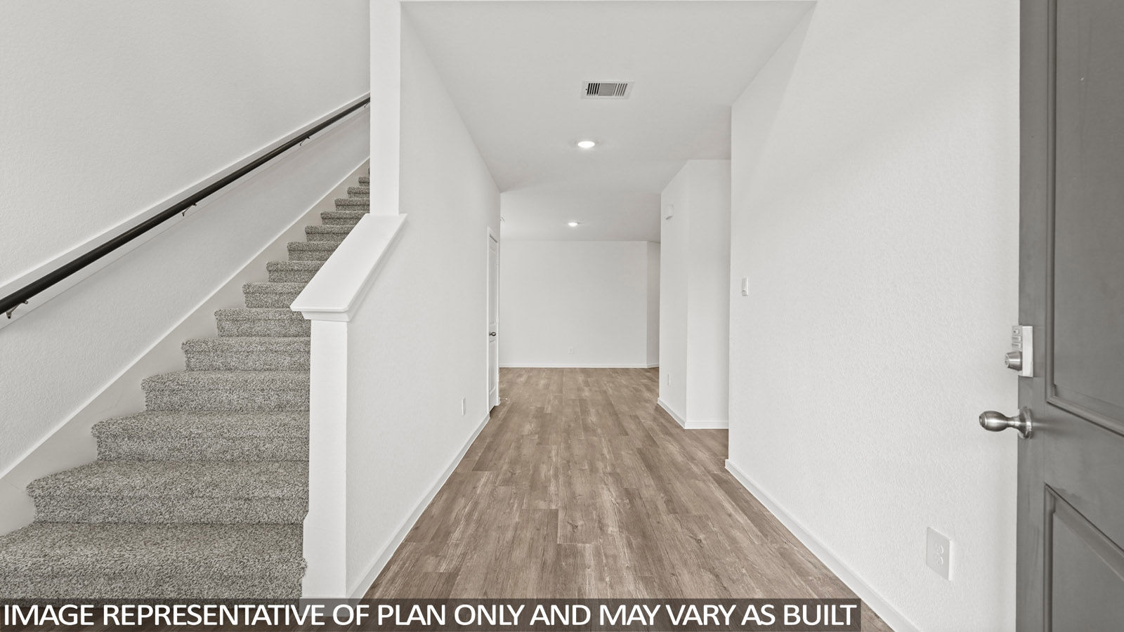 Entry hallway with vinyl flooring