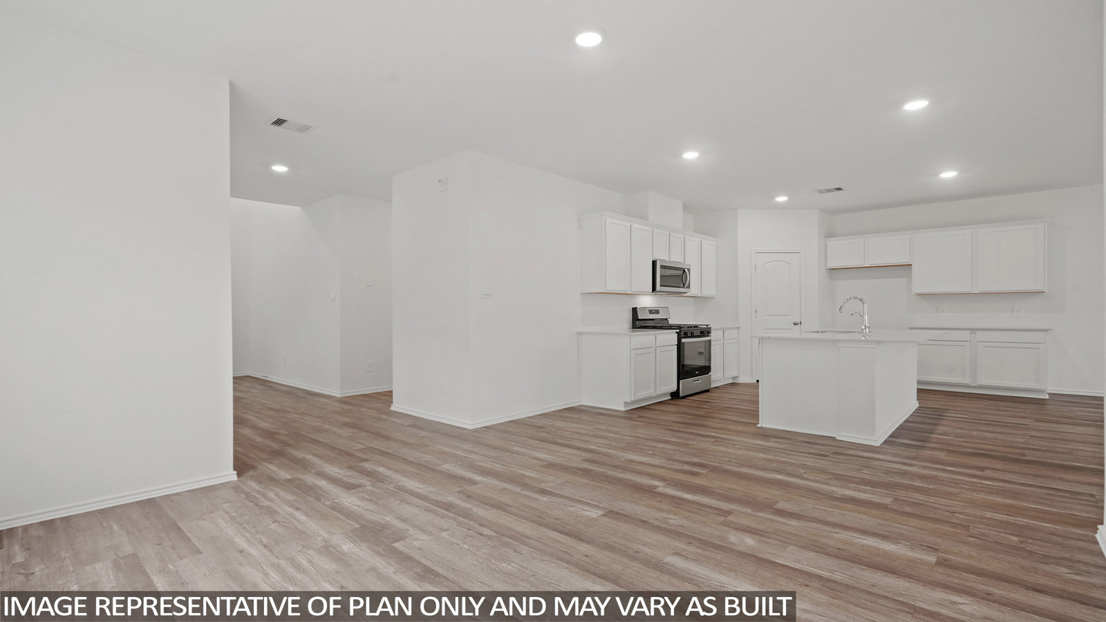 open concept livivng and dining area with vinyl flooring and large windows