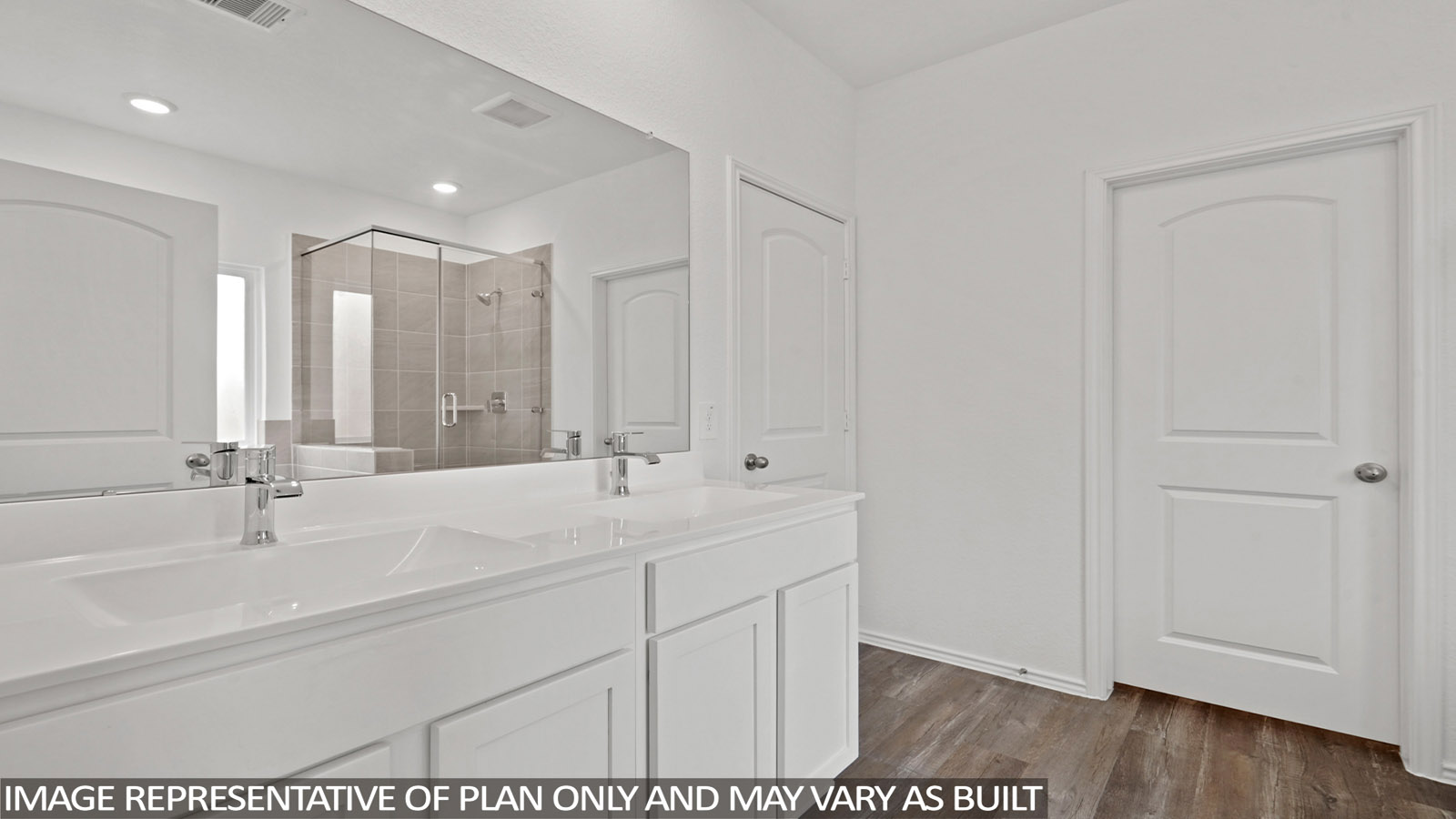 primary bathroom with separate tub and shower