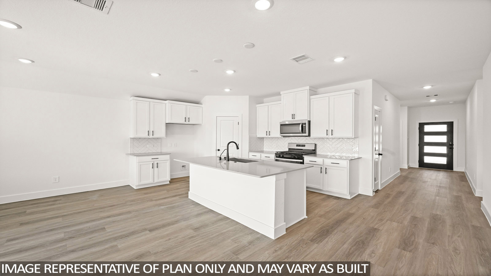 open concept living and dining area with vinyl flooring, quartz countertops, and stainless steel appliances in Katy,Tx
