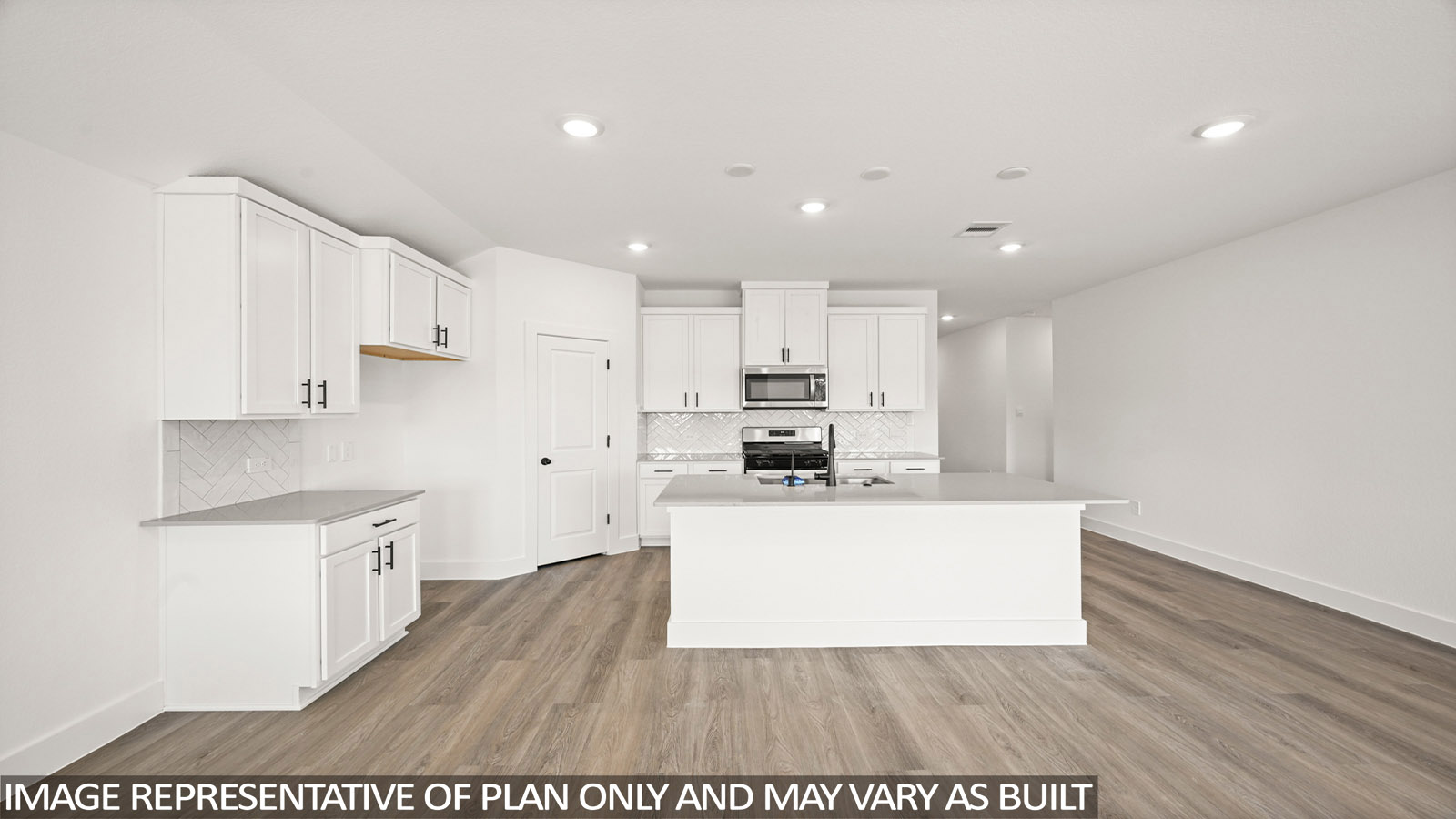 open concept living and dining area with vinyl flooring, quartz countertops, and stainless steel appliances in Katy,Tx