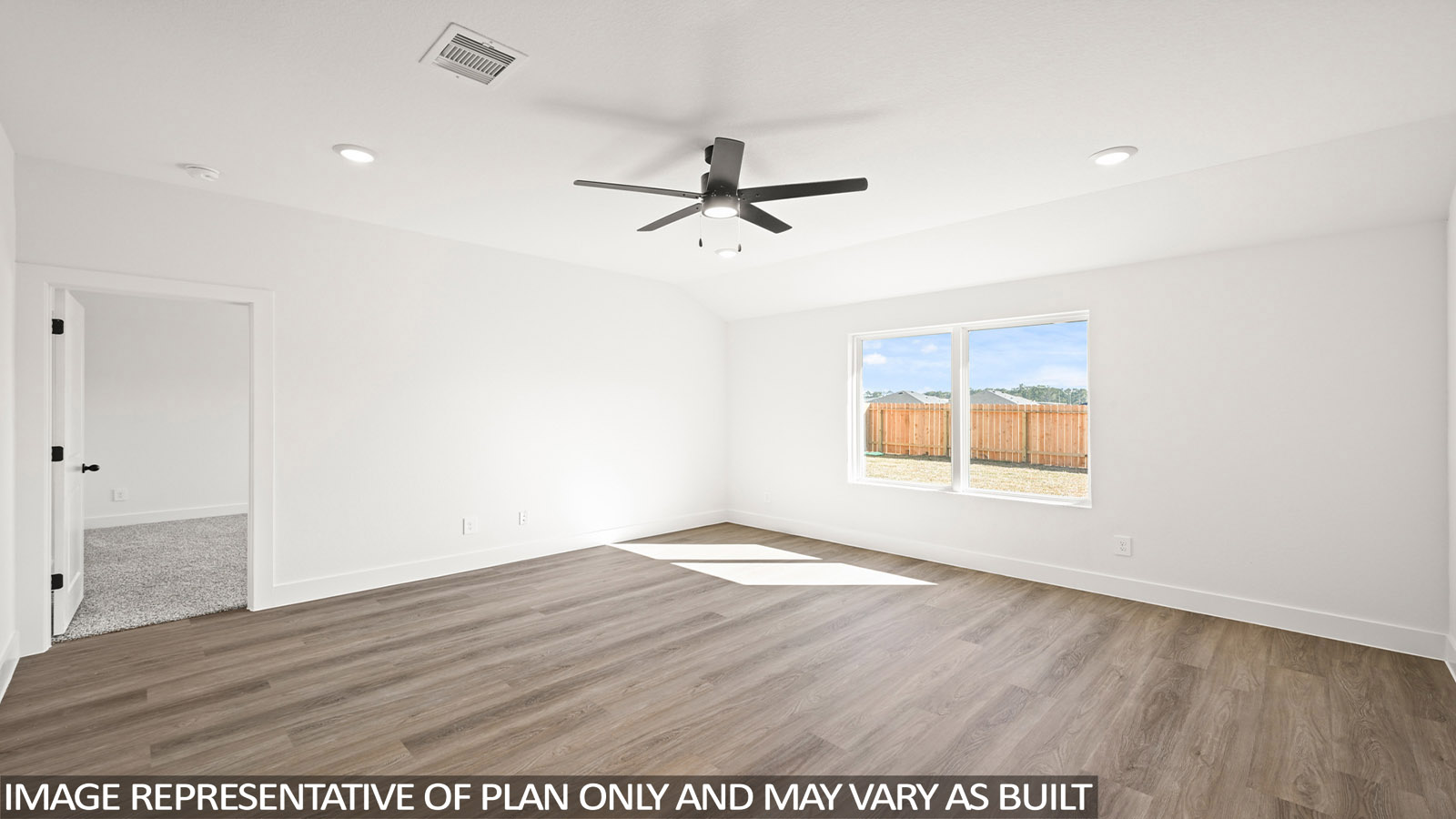 open concept living and dining area with vinyl flooring, quartz countertops, and stainless steel appliances in Katy,Tx