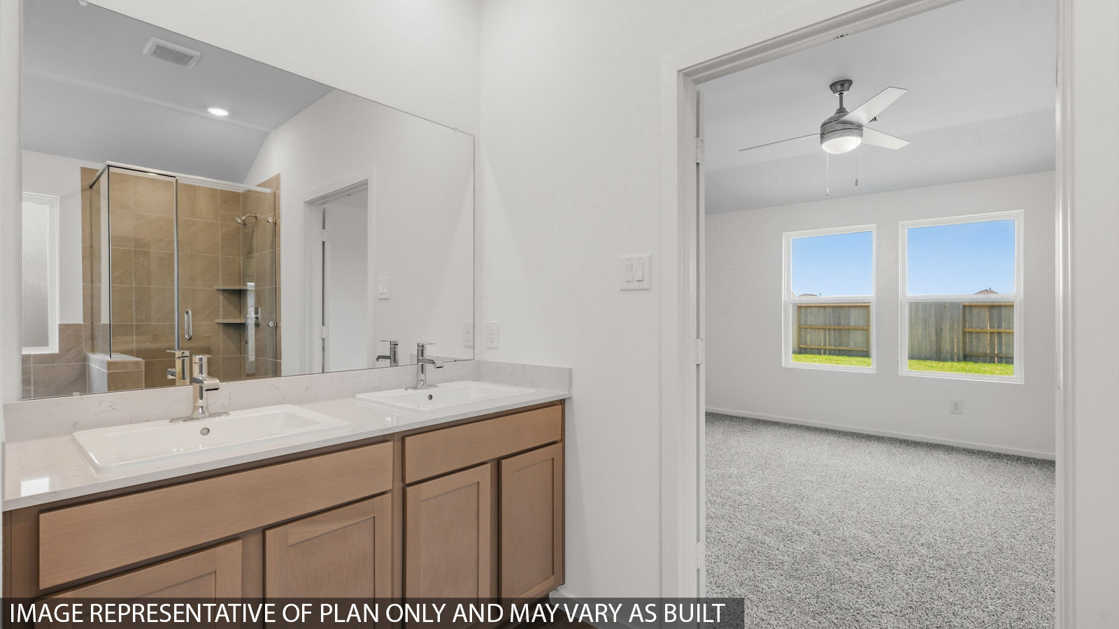primary bathroom with separate tub and shower