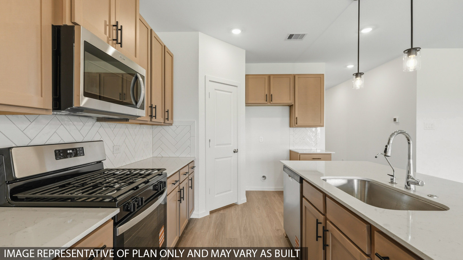 kitchen with quartz countertops and stainless steel appliances