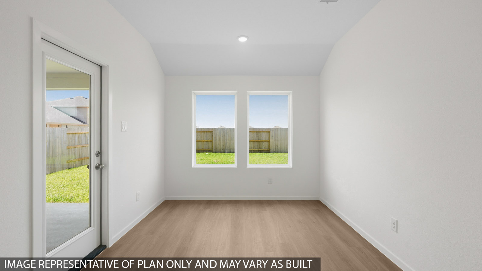 open concept living and dining area with vinyl flooring and large windows