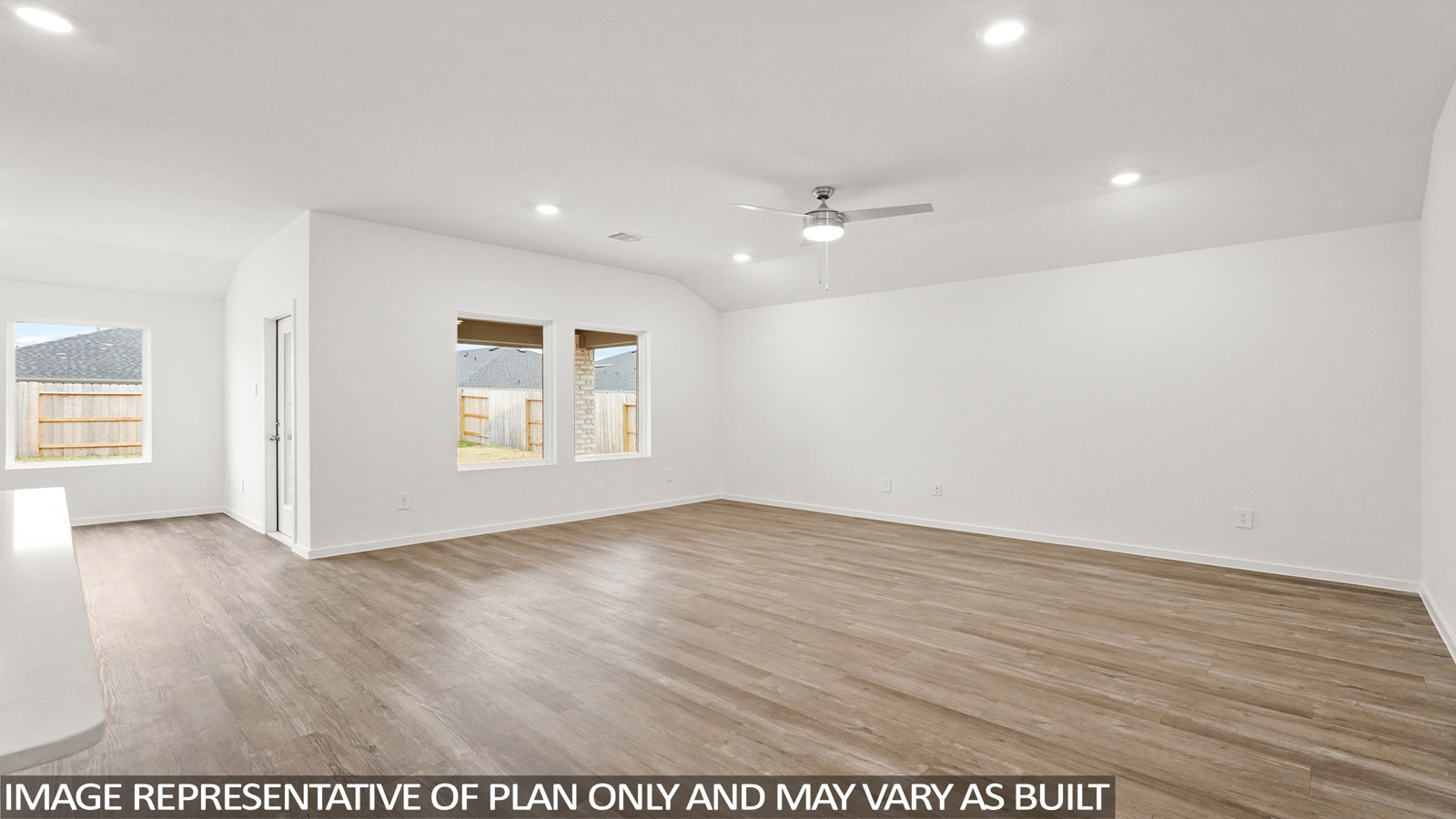 open concept living and dining area with vinyl flooring