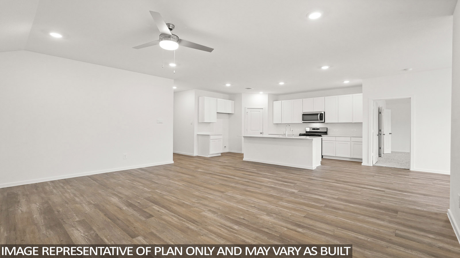 open concept living and dining area with vinyl flooring