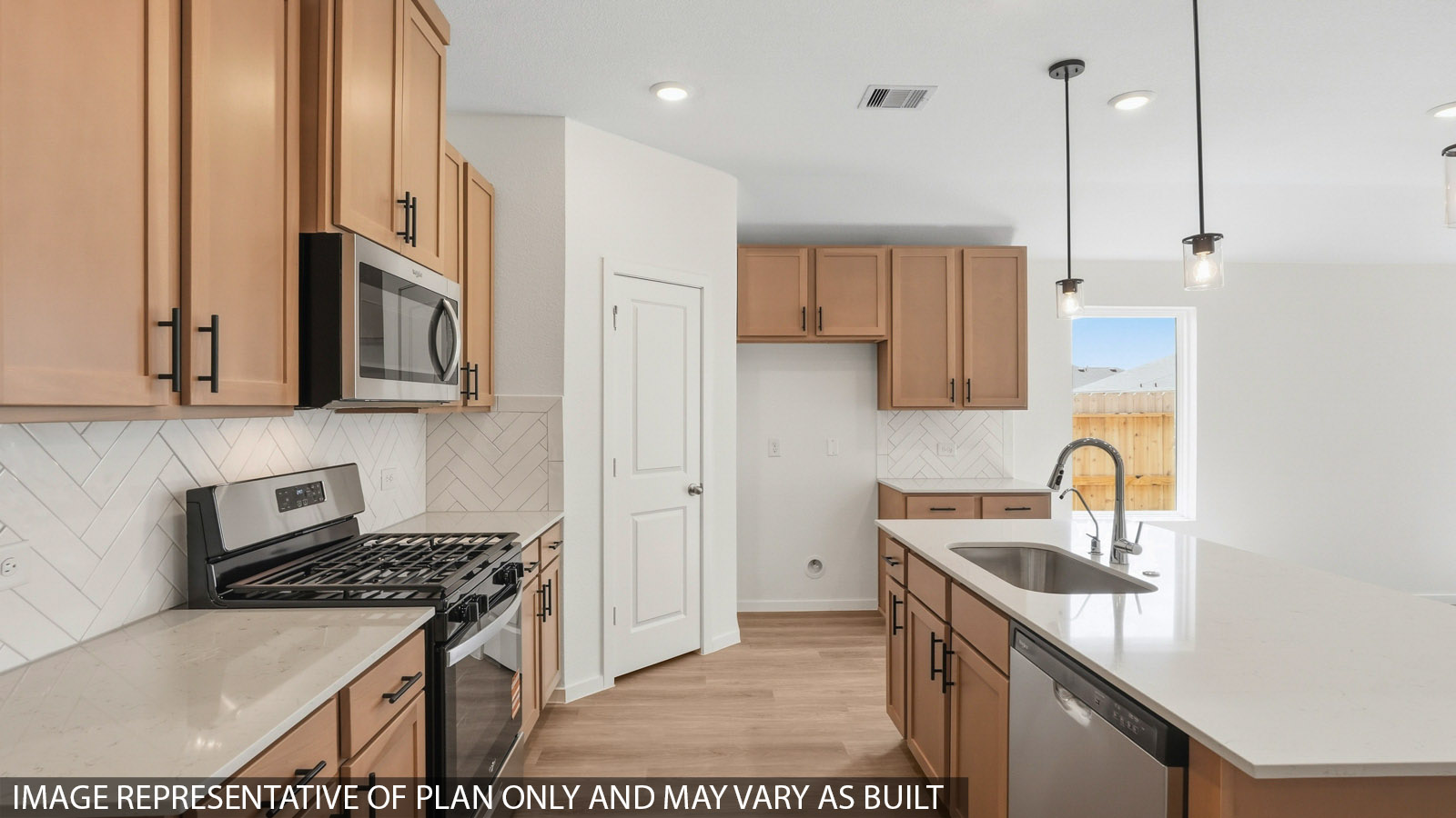 kitchen with quartz countertops and stainless steel appliances