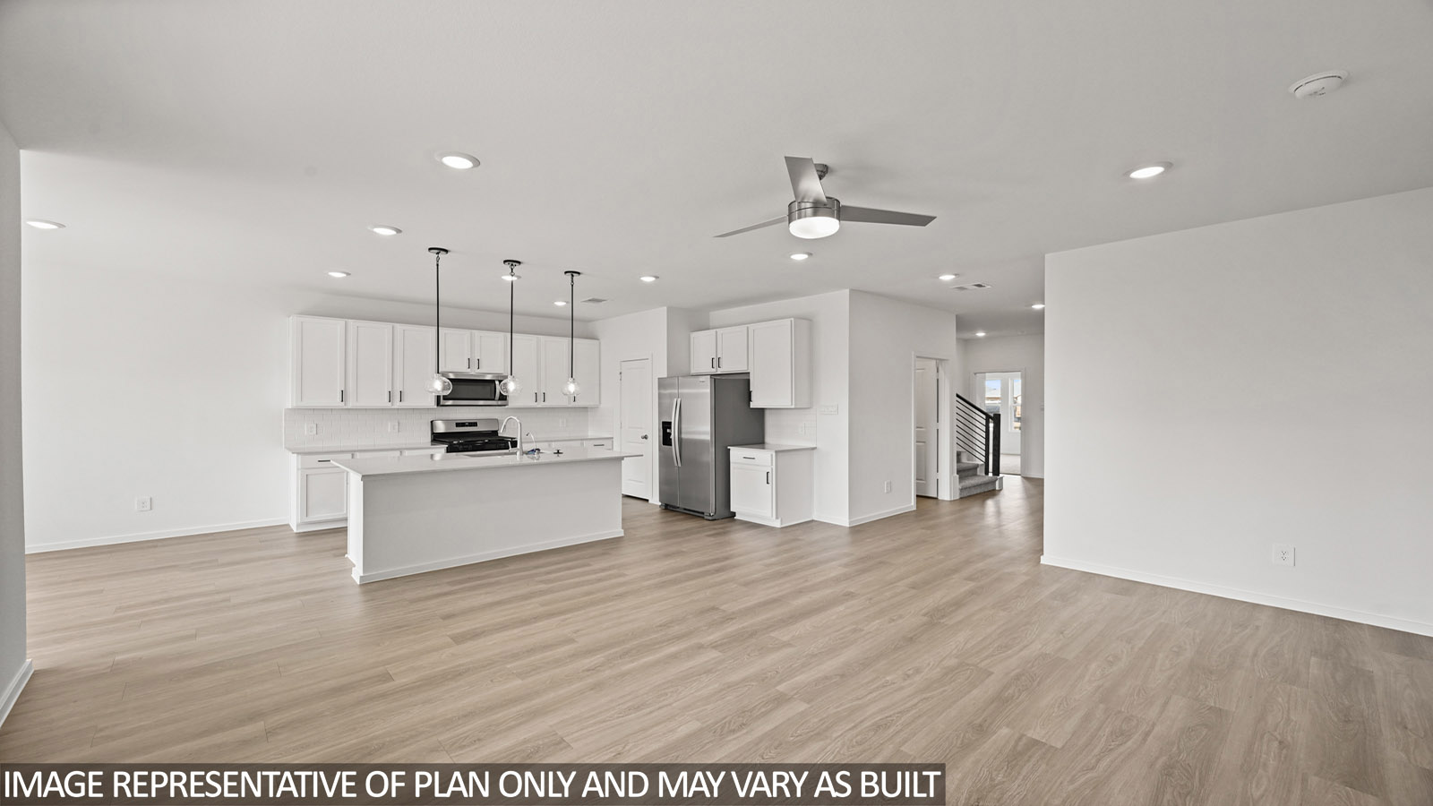open concept living and dining area with vinyl flooring