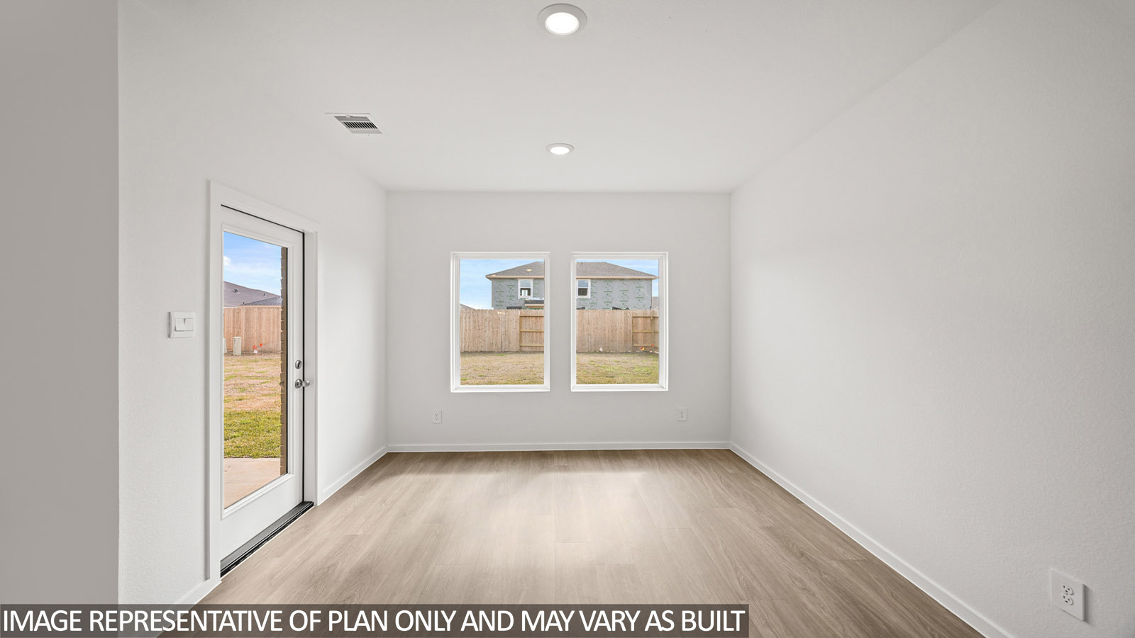 open concept living and dining area with vinyl flooring