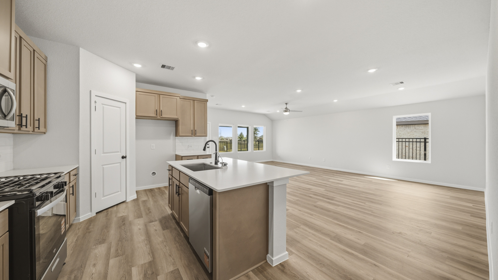 kitchen with quartz countertops and stainless steel appliances