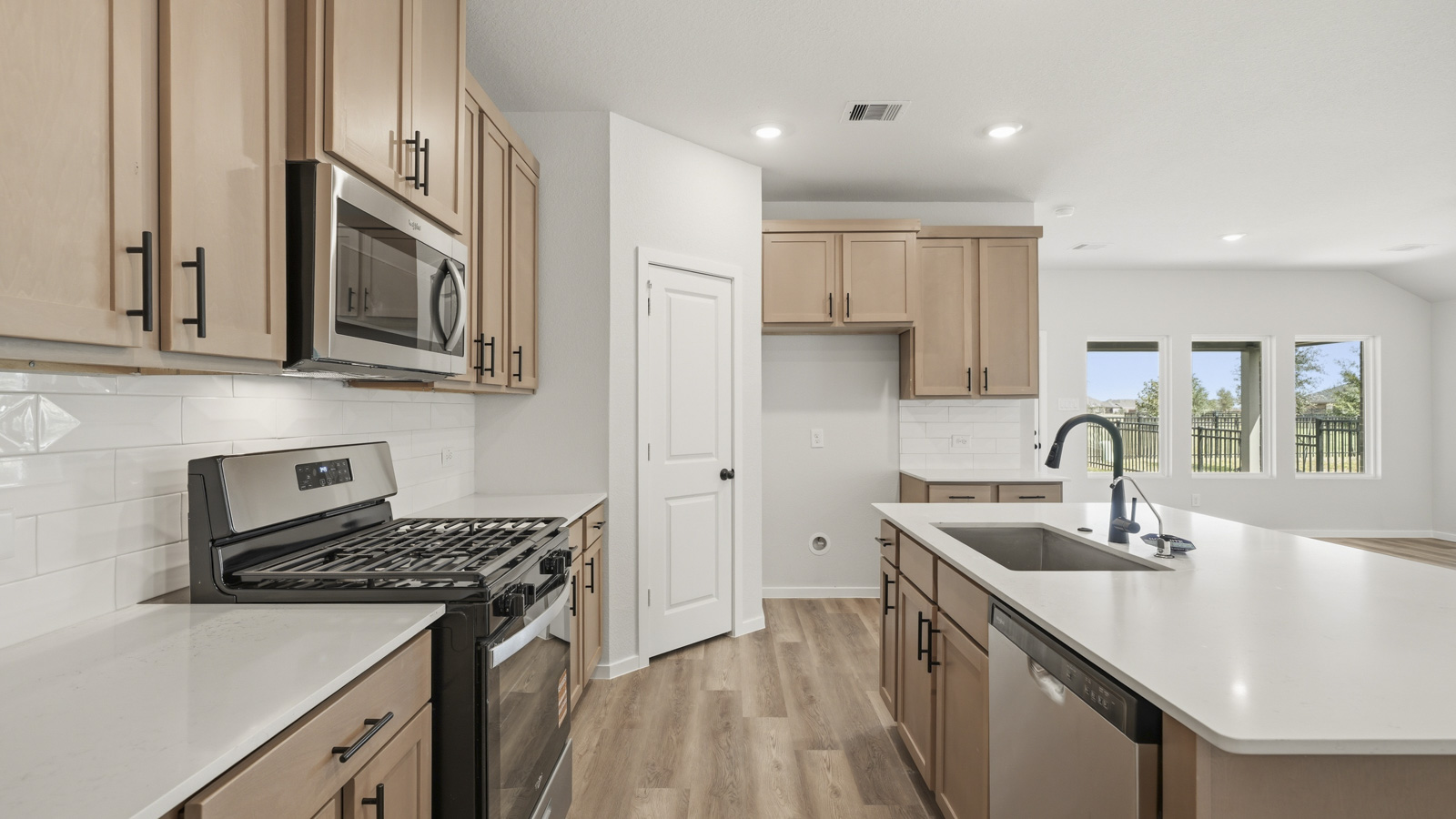 kitchen with quartz countertops and stainless steel appliances
