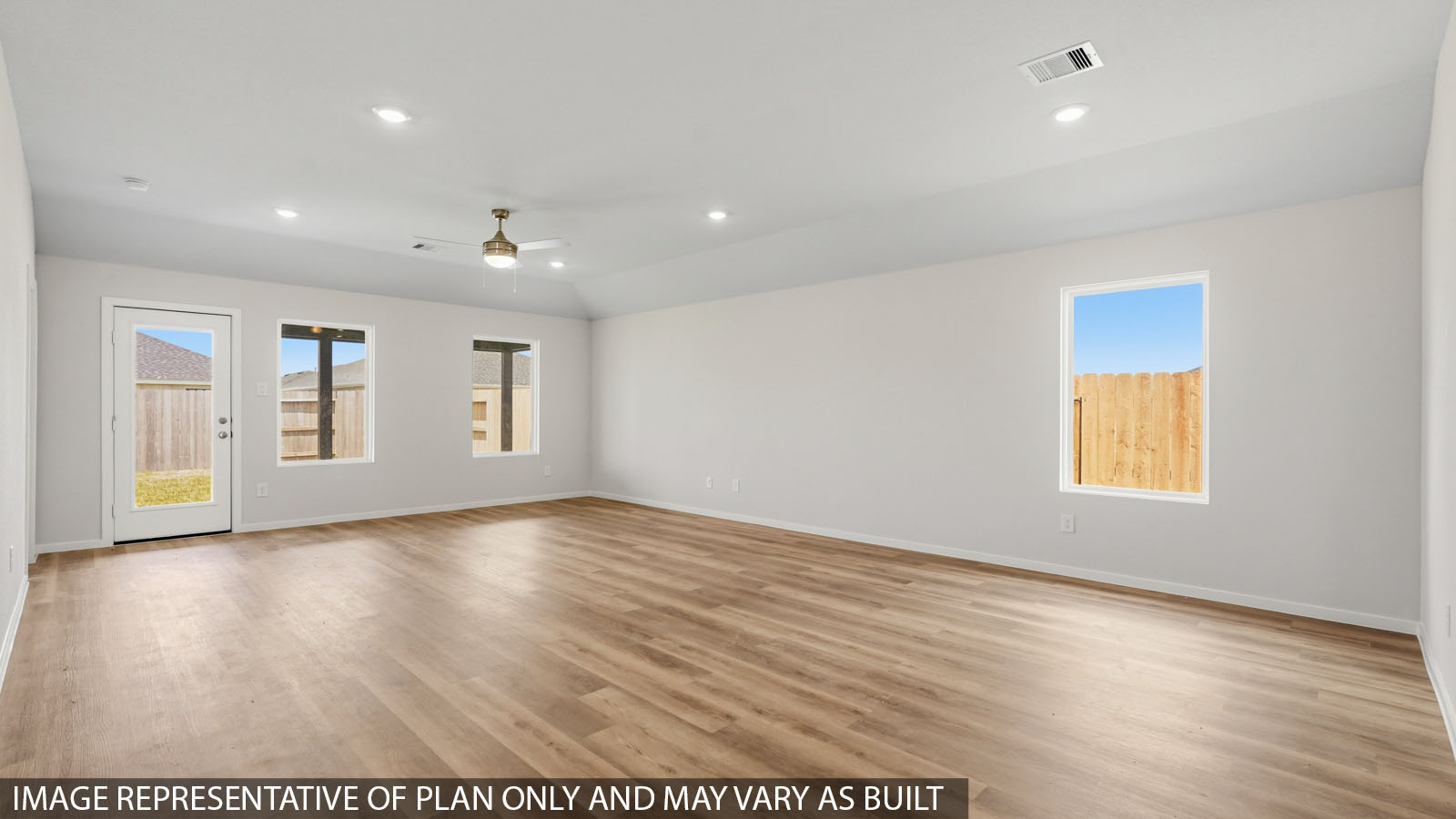 open concept living and dining area with vinyl flooring and large windows?
