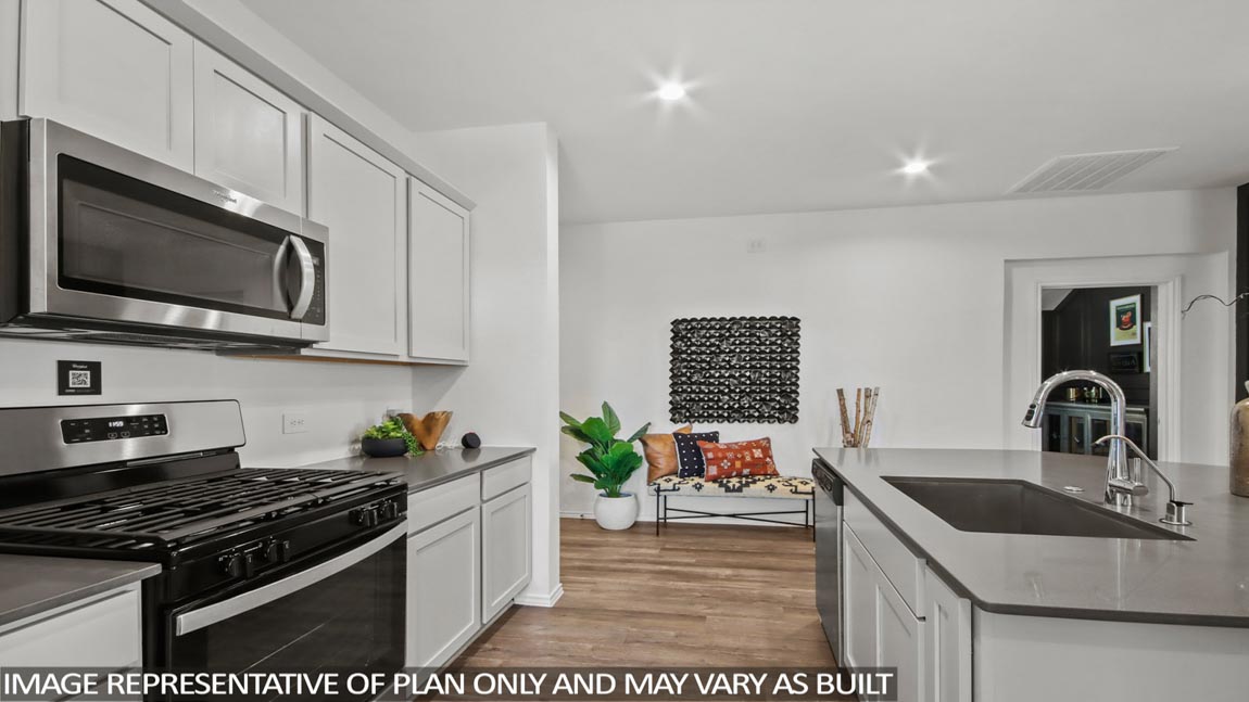 oprn concept living and dining area with vinyl flooring, large windows, and quartz countertops