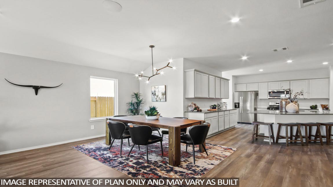 open concept living and dining area with vinyl flooring, large windows, and quartz countertops