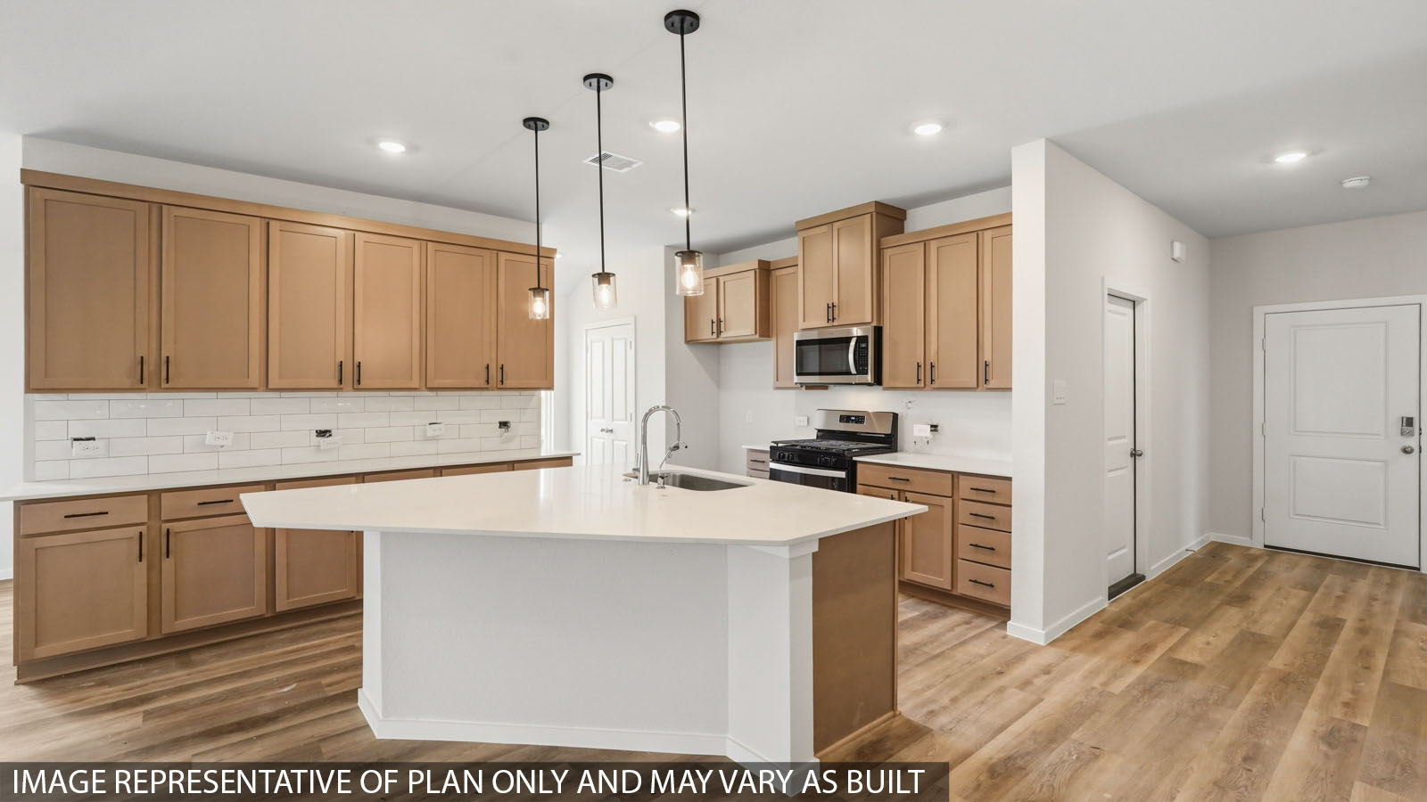 kitchen with quartz countertops and stainless steel appliances