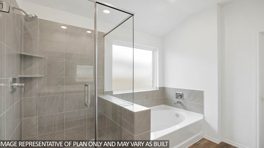 Primary bathroom with tub and shower